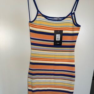 Brand New! Bodycon Maxi Dress. Size L. Tags attached never worn. Multicolor